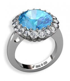 rosettring i 18 k vitguld med topas