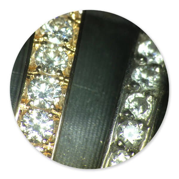 fattningsarbete av briljantslipade diamanter utfört av 2 olika juvelfattare