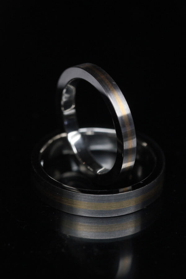 finguld inlagt i vitguld