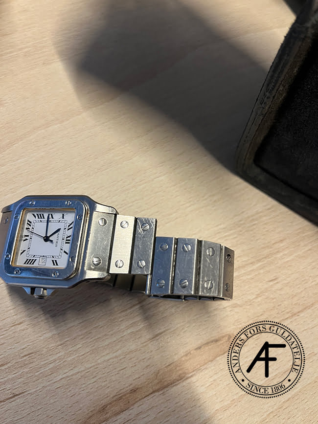 trasig klocklänk Cartier